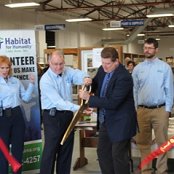 The ribbon is cut officially opening the ReStore in its new location at 550 W. Elm St. in Lima.